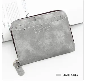 Detail view of light grey frosted men's short wallet with card holder and zipper.