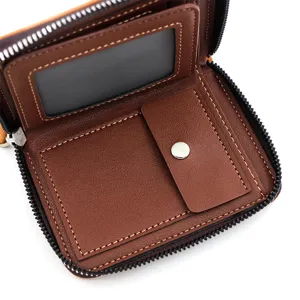Interior detail of men's short zip-around leather wallet showing card slots and coin pocket