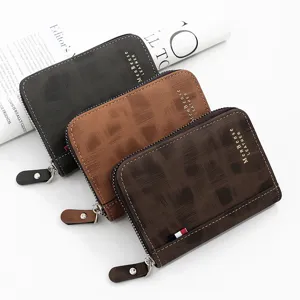 Close-up of three men's zip-around leather wallets in black, brown, and coffee