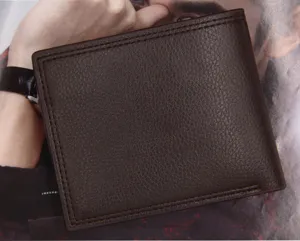 Detailed view of the premium brown leather texture and stitching on this men's short wallet.