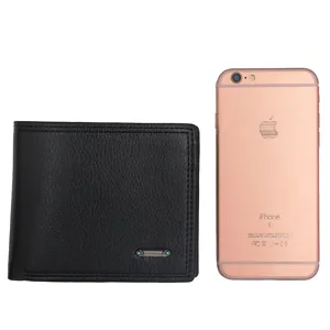 Black short men's wallet with leather texture and brand tag compared to a smartphone.