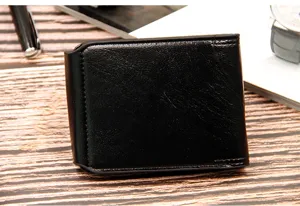 Close-up view of a sleek black men's bifold wallet with refined stitching detail.