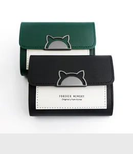 Detail of compact trifold wallets with cat-shaped buckle and Forever Memory print.