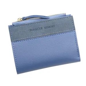 Petit portefeuille bleu pour femme avec empiècement en daim et fermeture éclair élégante