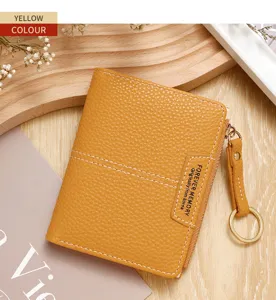 Petit portefeuille jaune en cuir grainé pour femme avec fermeture éclair et porte-clés