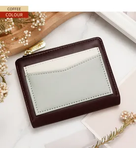 Detailed view of coffee-colored women's zip-around wallet with color-blocking card slots
