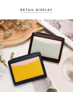 Close-up of contrast color women's zipper card holder wallets on a stylist background