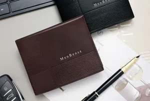 Close-up of MenBense business wallet with minimalist textured design and logo detail