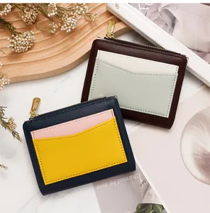 Detail view of stylish color-block women's short zipper wallet and card holder