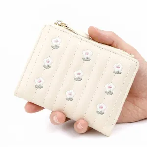 Small women's zipper wallet with elegant embroidered flowers and multi-card slots.