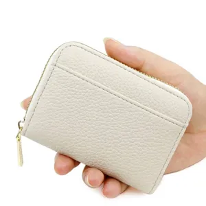 Petit porte-cartes accordéon en cuir de couleur bonbon avec motif litchi et zip doré