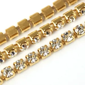 Gold rhinestone cup chain detail, sparkly crystal trim for DIY crafts and jewelry making.