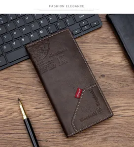 Elegant brown PU leather long wallet for men displayed on wooden desk with keyboard and pen