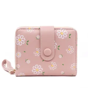 Petit portefeuille rose imprimé marguerites pour femme avec bouton pression et dragonne