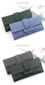 Elegant long tri-fold faux leather wallet for women featuring a secure buckle closure