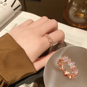 Elegant rose gold adjustable flower ring with shimmering zircon accents for women