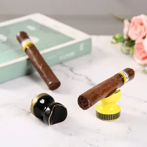 Elegant portable ceramic cigar stand holder in black gold and yellow dotted design