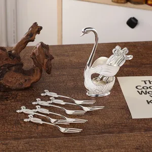 Elegant silver swan base with 6 stainless steel fruit forks for dessert and coffee