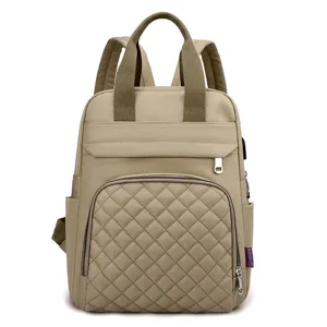 Large capacity stylish diaper bag backpack with quilted front pocket and USB port
