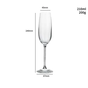 Crystal champagne glass with dimension details, 210ml capacity and diamond-filled stem