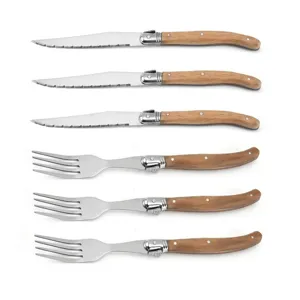 Detailed close-up of 6-piece acacia wood handle serrated steak knife and fork set