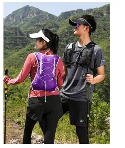 Professional outdoor hydration vest backpack shown in use by hikers on a scenic mountain trail.