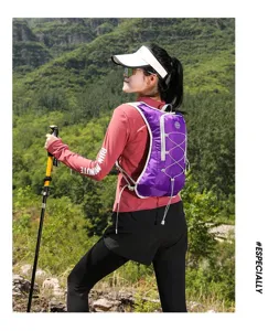 Macro view of purple hydration vest backpack for outdoor running and hiking
