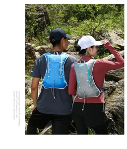 Outdoor runners wearing lightweight hydration vests in a scenic rocky landscape