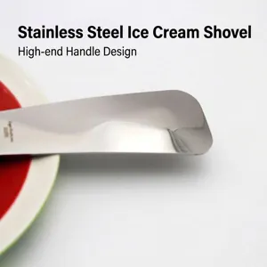 Close-up of stainless steel ice cream shovel head with shiny metallic finish