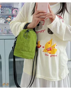Green lightweight nylon crossbody bucket bag for outdoor camping and cycling workwear