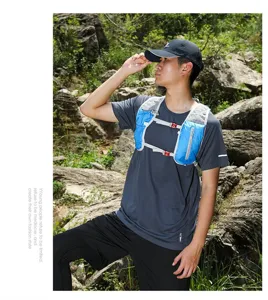 A fit male athlete wearing a blue running vest backpack for marathon hiking outdoor training