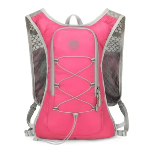 Pink lightweight running vest backpack with breathable mesh for marathon and trail.