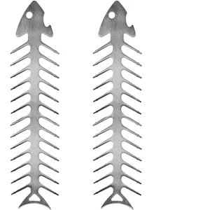 Macro detail of stainless steel fish bone barbecue skewers with a brushed metal finish