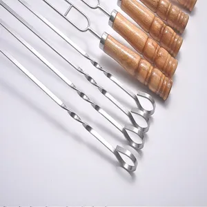 Stainless steel BBQ skewers with wooden handles for grilling meat, kebabs, and outdoor parties.