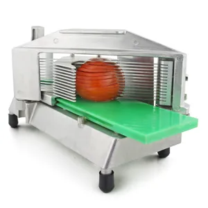 Commercial stainless steel multi-blade fruit slicer shown slicing a fresh tomato.