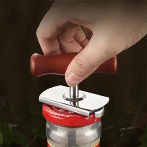 Adjustable stainless steel jar opener with wooden handle for effortless bottle cap removal.