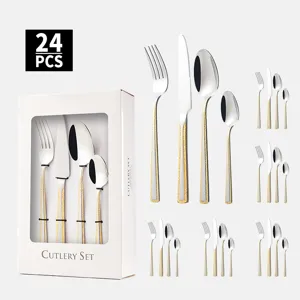 Ménagère 24 pièces en acier inoxydable avec manches dorés motif pierre et boîte
