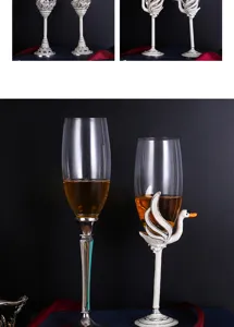 Detail view of luxury enamel crystal champagne glasses with elegant white swan relief