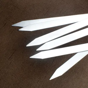 Stainless steel flat BBQ skewers for outdoor grilling, sharp tips for easy meat piercing.