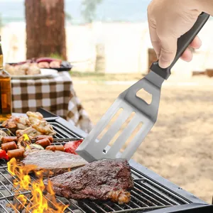 Professional stainless steel BBQ spatula with slotted turner and built-in bottle opener