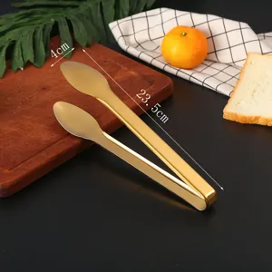 Macro view of gold stainless steel kitchen tongs with length and width dimensions shown