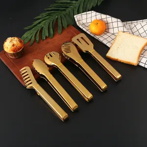 Premium set of five golden stainless steel kitchen food tongs for BBQ and bakery service