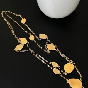 Elegant vintage brushed gold oval plate long necklace for women with designer aesthetic