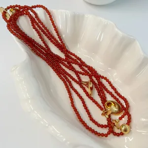 Vintage French red agate beaded long necklace with gold trumpet charms for women
