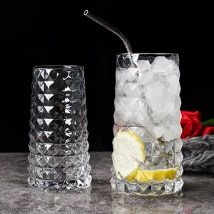 Premium transparent diamond-textured glass cups with reusable metal straw for cold drinks