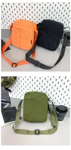 Detailansicht der farbenfrohen Nylon-Umhängetaschen in Orange, Schwarz und Olivgrün.
