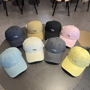 Assortimento di berretti da baseball in cotone lavato con ricamo Open Mind in otto colori