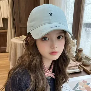 Light blue embroidered baseball cap for women, stylish letter design, casual outdoor sun hat.