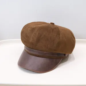 Stylish vintage brown newsboy hat with suede crown and faux leather brim accent