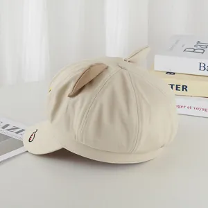 Detailed side view of a beige octagonal sun hat featuring cute decorative cat ears